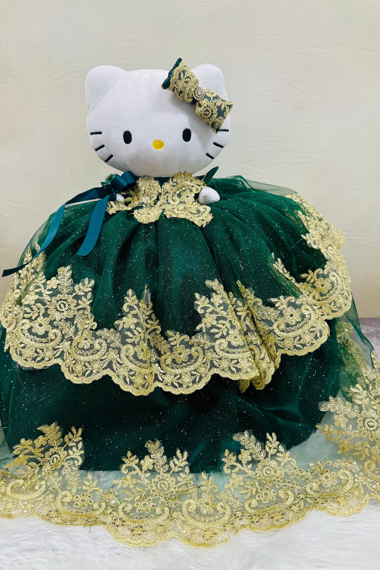 Lovely Hello Kitty plush doll for quinceañera party, accessible for visually impaired.