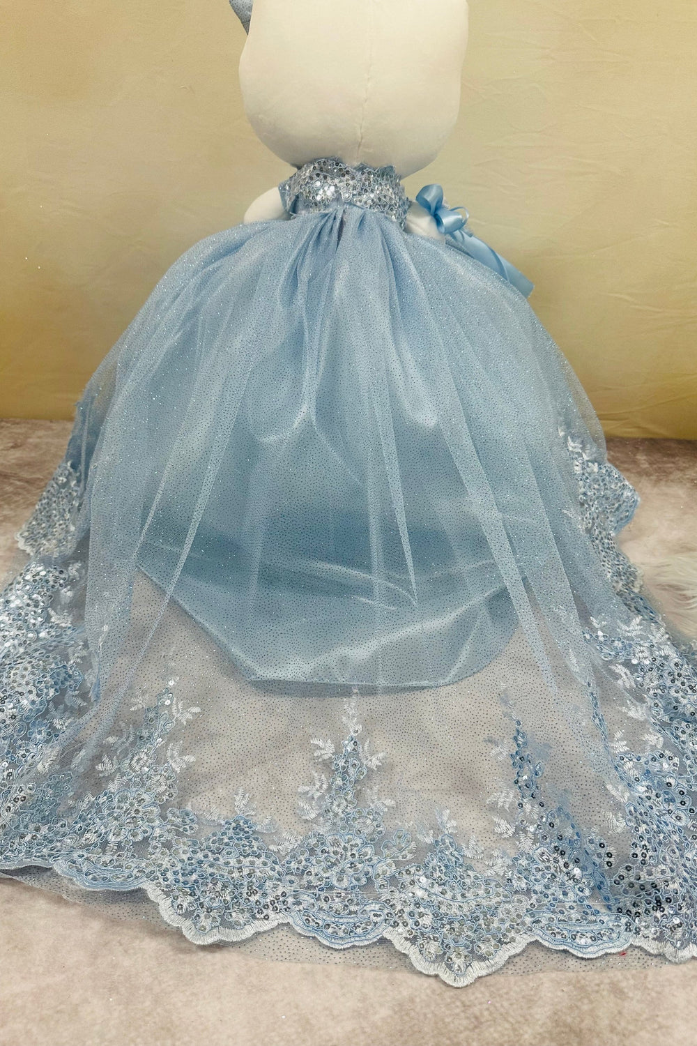 Beautiful Hello Kitty plush doll for quinceañera party, accessible for visually impaired.