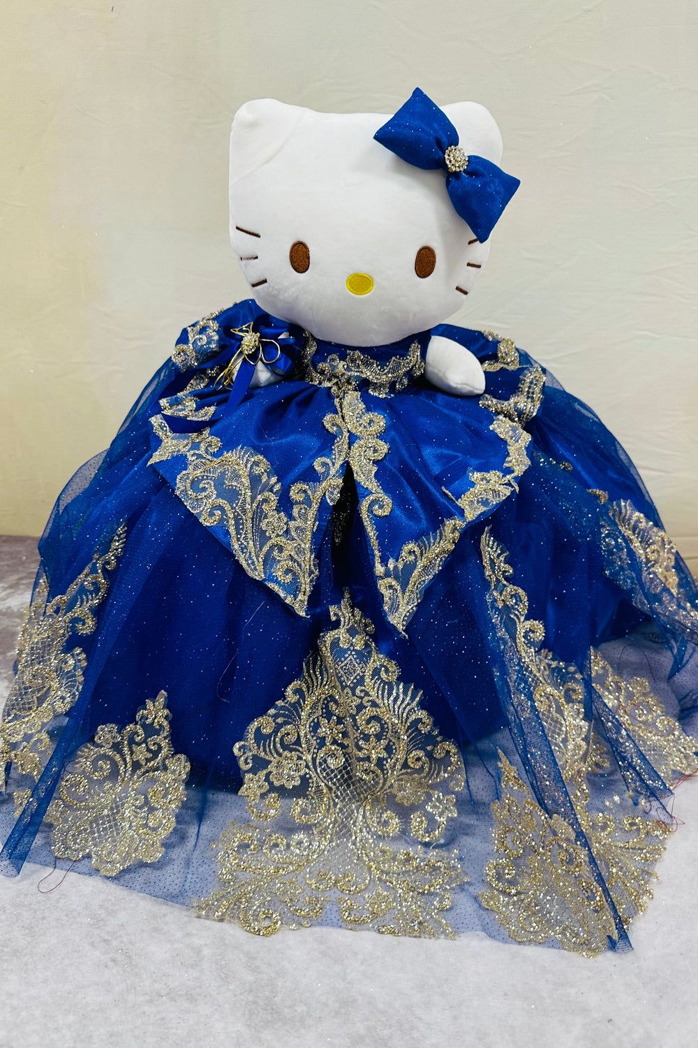 Adorable Hello Kitty plush doll for quinceañera party.ROYAL AND GOLD 