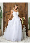 Woman in a white wedding dress holding a bouquet in front of a wooden door with cacti.plus size tulle ball gown dress with floral appliqué and pockets – www.snkdress.com