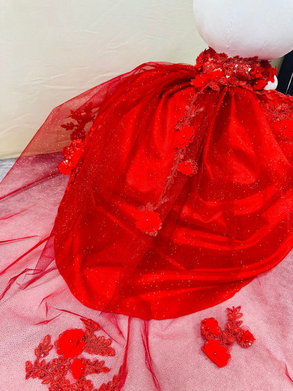 red Hello Kitty plush doll for quinceañera party, accessible for visually impaired.