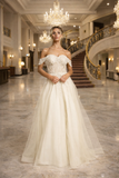 off-shoulder tulle gown by Joy Collection 10304