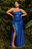 Woman wearing a blue sequin dress standing against a green leafy background. Strapless Sequin Plus Size Gown by Ladivine CH165C