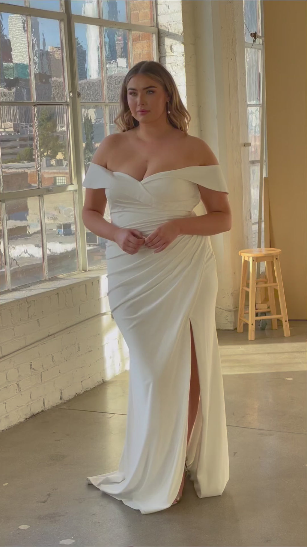 This off-white stretch satin gown By Ladivain cd930C