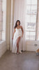 off white draped satin corset gown with thigh-high slit and brush train